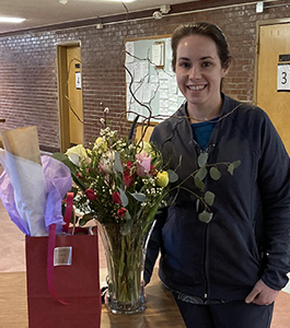 school nurse with flowers